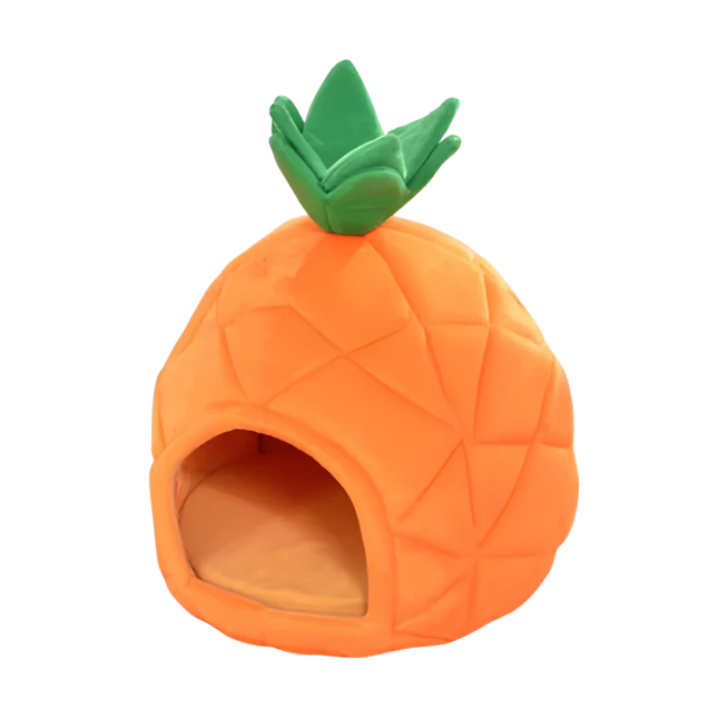 Pineapple-shaped pet bed with green top on a white background