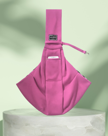 Pink sling bag on a light green background