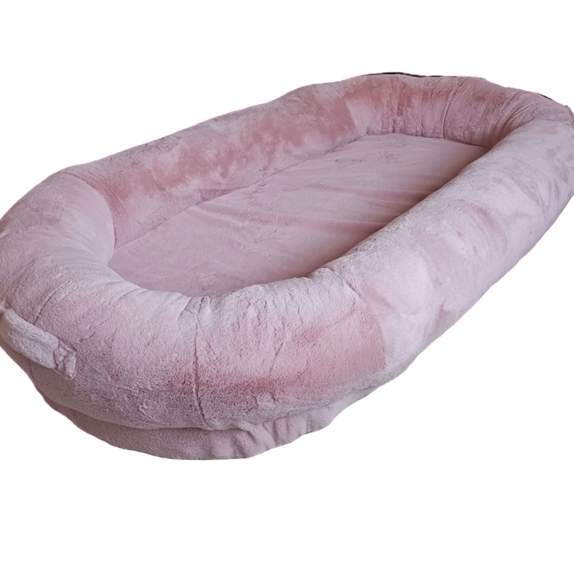 Pink pet bed on a white background