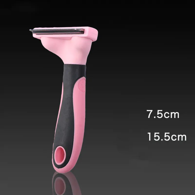 Pink and black pet grooming tool on a dark background with measurements indicated.