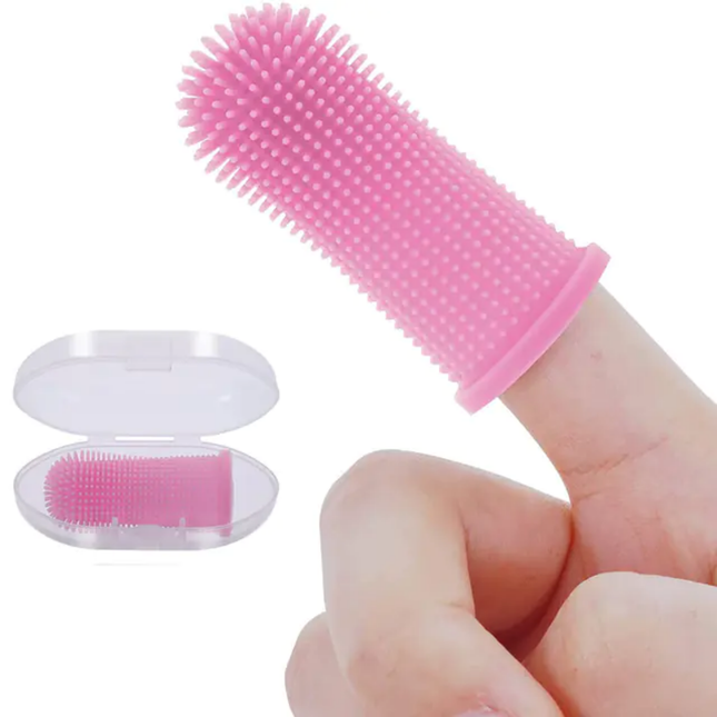 Pink silicone scrubber on a finger with inset showing brush head