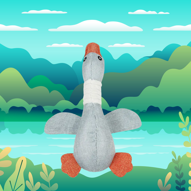 Plush goose toy with a colorful background of mountains and water