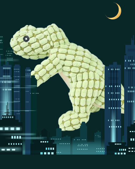 Lizard-like creature made of green blocks against a cityscape at night