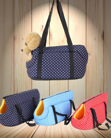 Four polka dot pet carriers in blue, red, and black with a wooden background.