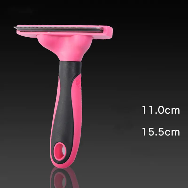 Pink and black pet grooming brush with measurements on a black background