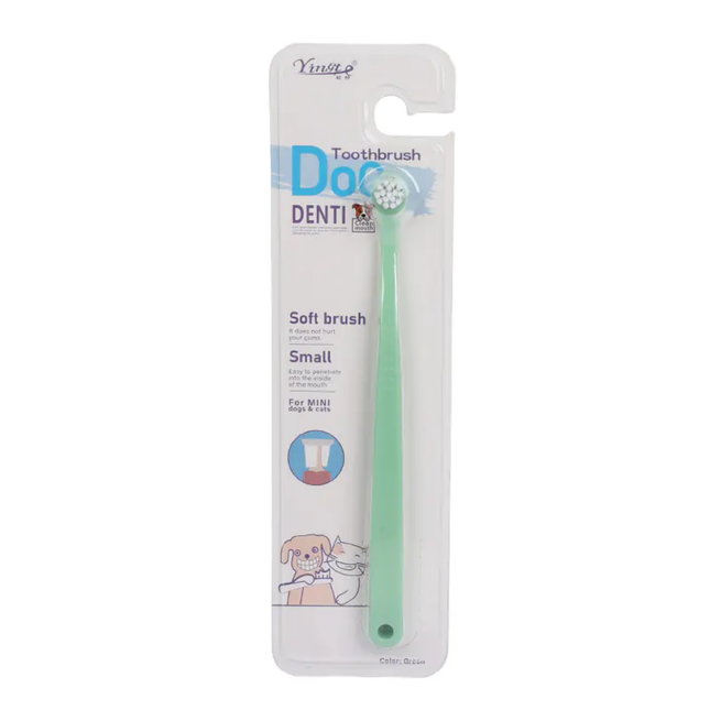 Dog toothbrush with packaging on a white background