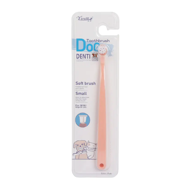 Dog toothbrush with packaging on a white background