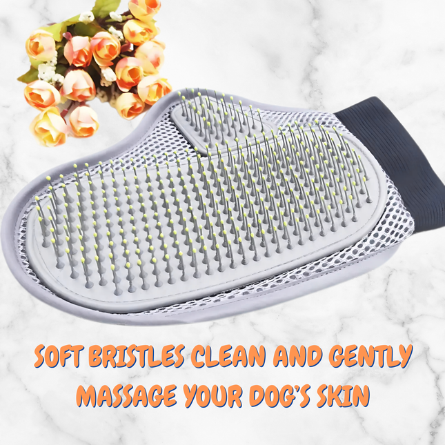 Pet grooming brush with soft bristles on a white surface with flowers in the background