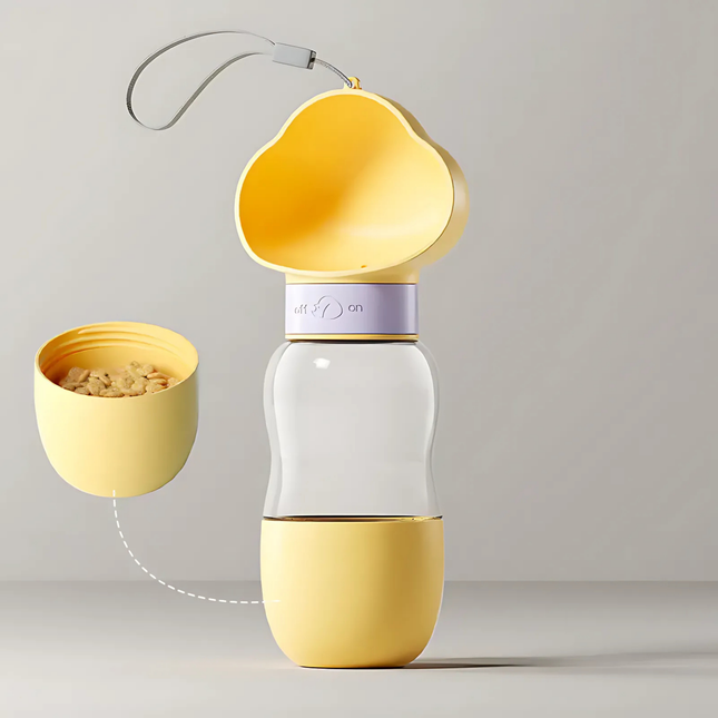 Yellow and white portable pet feeder with detachable bowl on a gray background